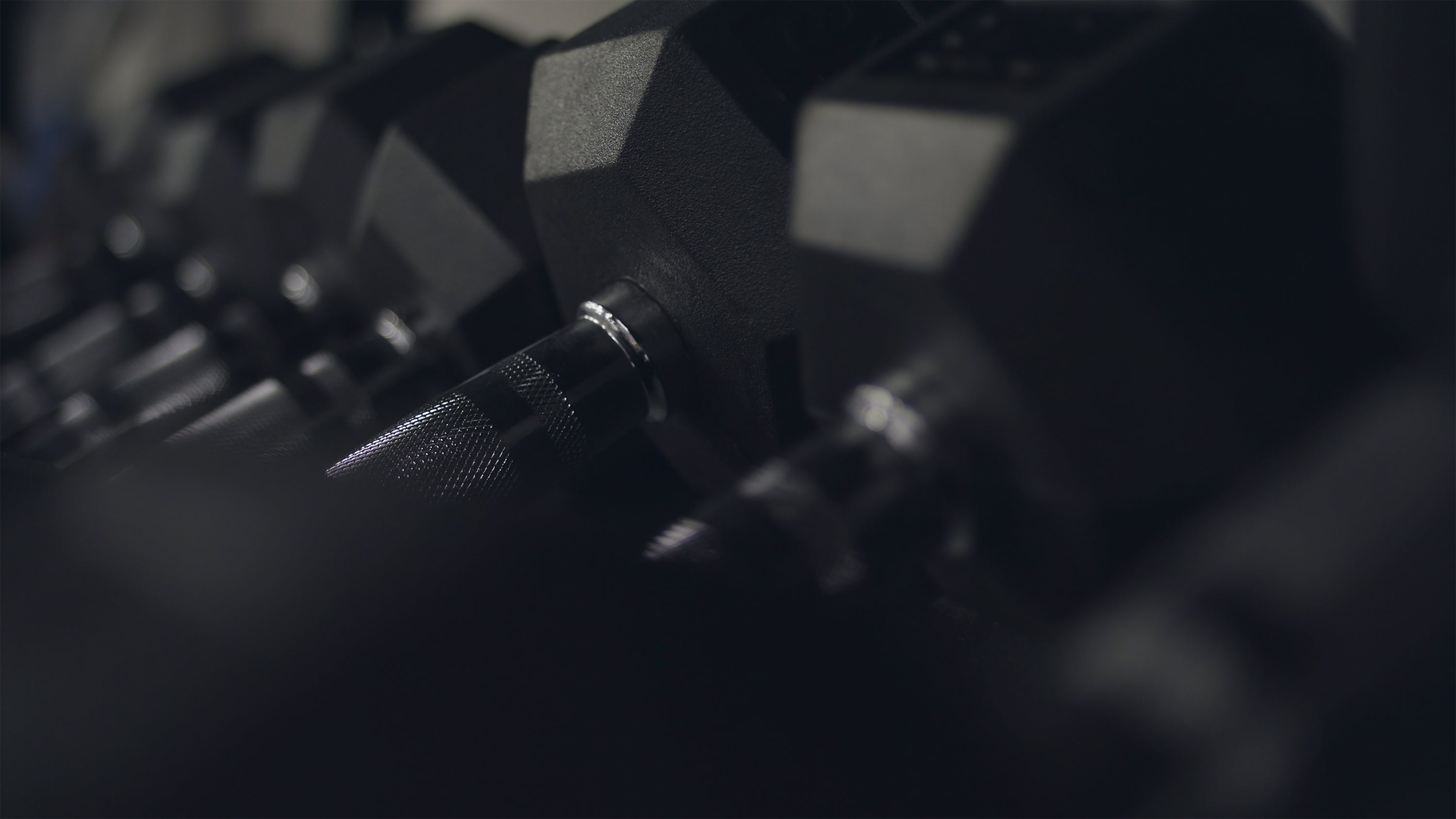 Close-up of a dumbbell with a blurred background